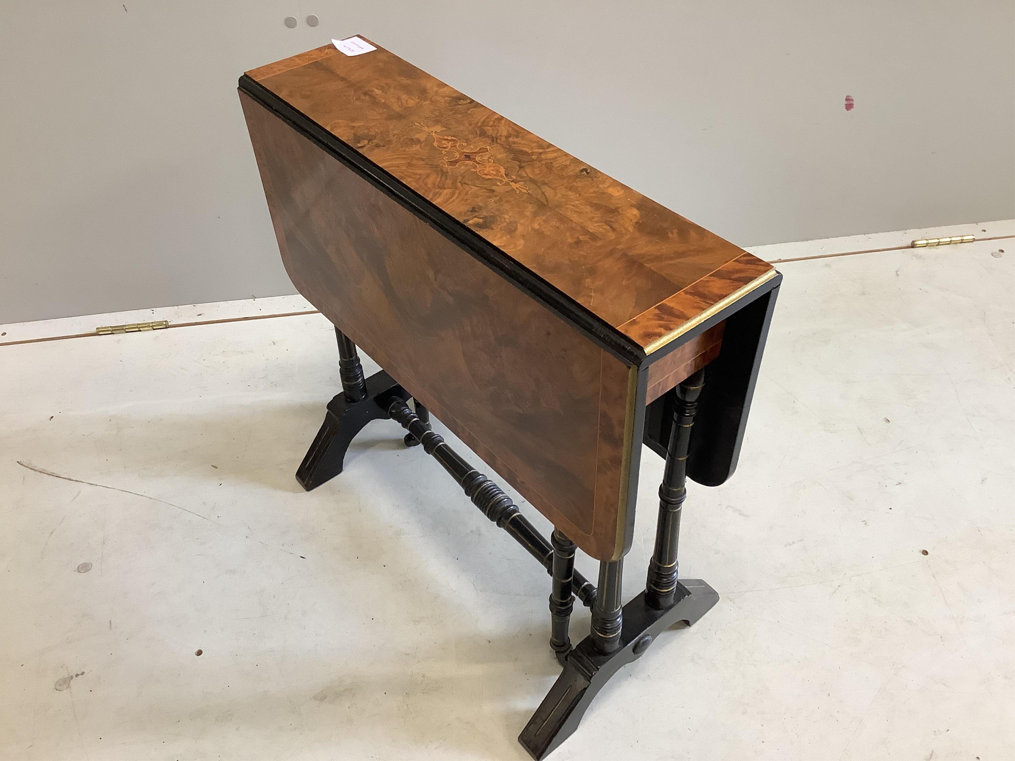 A late Victorian inlaid walnut and ebonised Sutherland table, width 56cm, depth 16cm, height 54cm. Condition - good